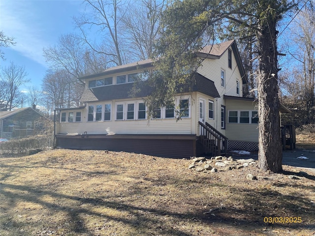 back of property with entry steps