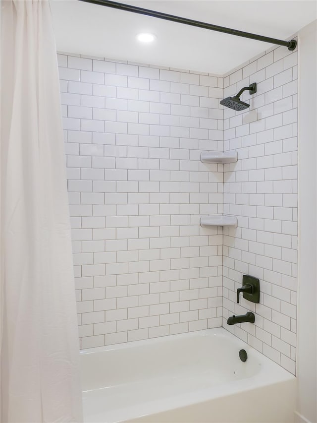 bathroom featuring shower / bathtub combination with curtain