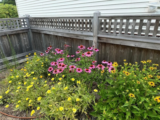 exterior details featuring fence