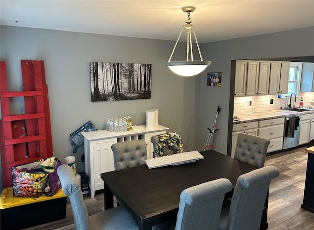 dining area with dark wood-type flooring