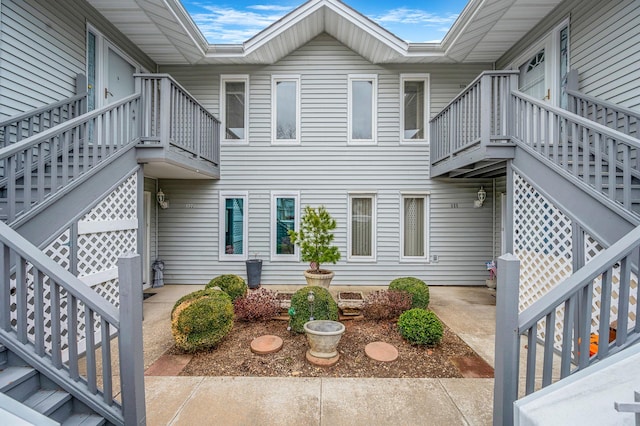 view of home's exterior with stairs