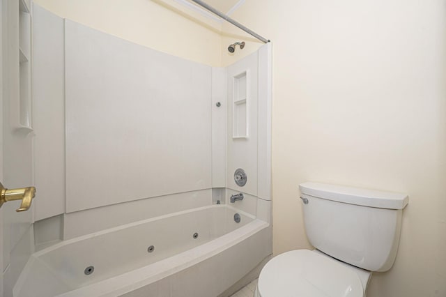 bathroom featuring a combined bath / shower with jetted tub and toilet