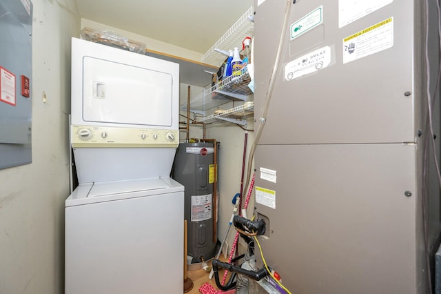 laundry room with stacked washer / drying machine, laundry area, water heater, and heating unit