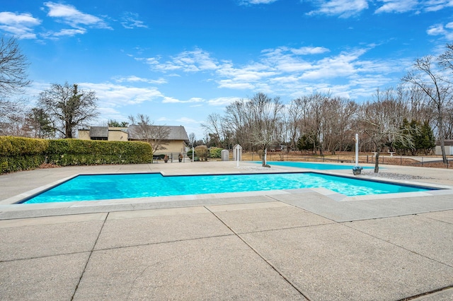 view of pool with a patio, fence, and a fenced in pool