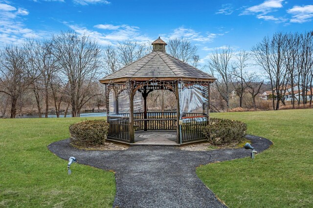 view of home's community featuring a lawn and a gazebo