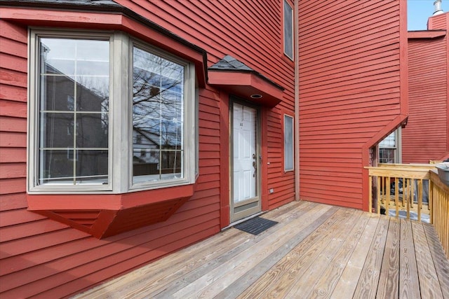 doorway to property with a wooden deck