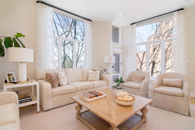 living area with recessed lighting and a healthy amount of sunlight