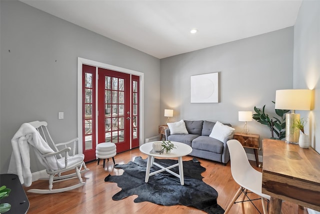 living area featuring recessed lighting and wood finished floors