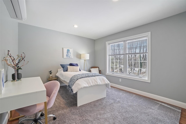 bedroom featuring recessed lighting and baseboards