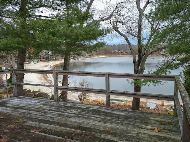 deck featuring a water view