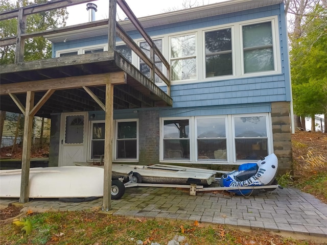 back of house with a patio