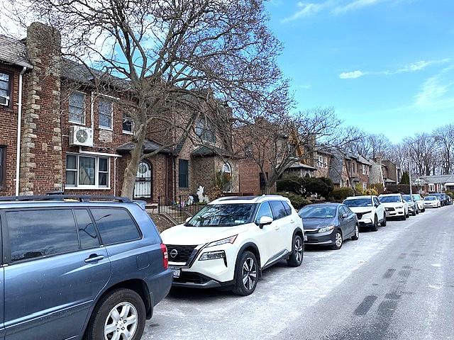 view of road with a residential view