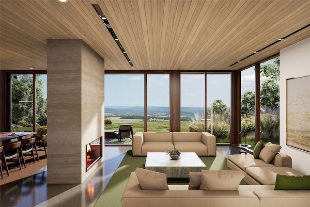 sunroom / solarium featuring wooden ceiling