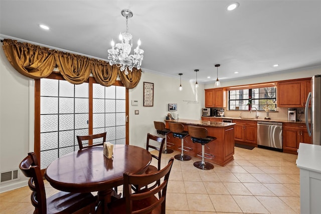 dining room featuring recessed lighting, visible vents, crown molding, and light tile patterned flooring