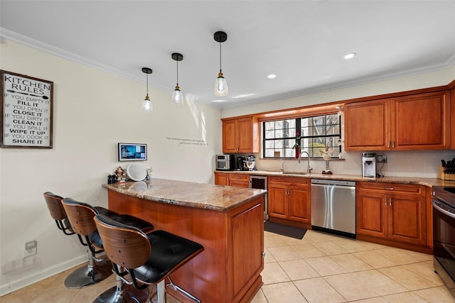 kitchen with ornamental molding, brown cabinets, a sink, and stainless steel dishwasher