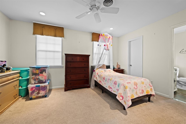 bedroom featuring recessed lighting, light colored carpet, and baseboards