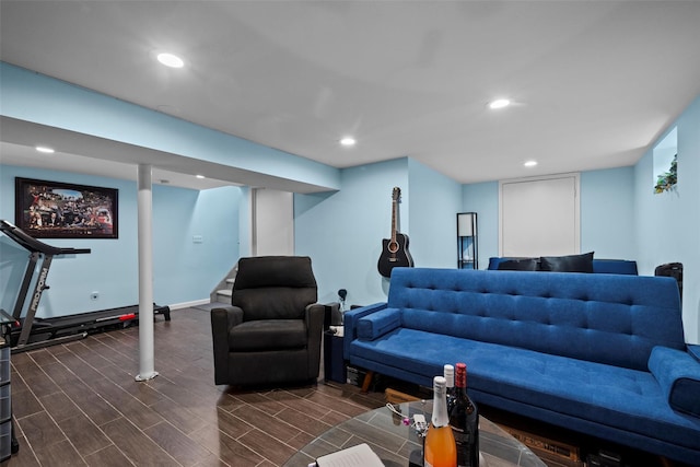 living room with wood tiled floor, baseboards, and recessed lighting