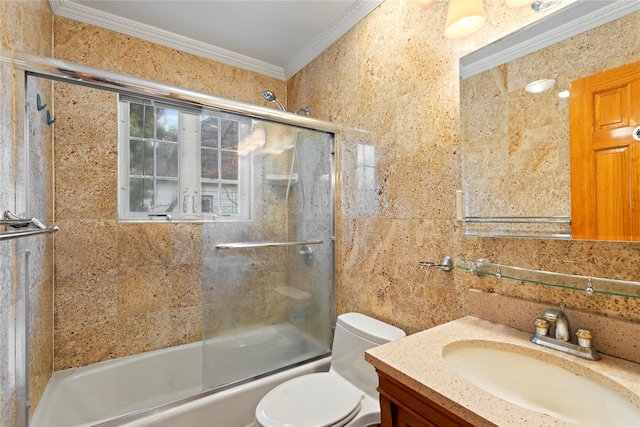 full bath with enclosed tub / shower combo, ornamental molding, vanity, and toilet