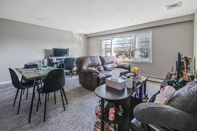 living area with a baseboard heating unit, carpet, visible vents, and baseboards