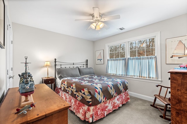380 Hickory Rd, Southold, NY 11971 - carpeted bedroom featuring visible vents, ceiling fan, and baseboards