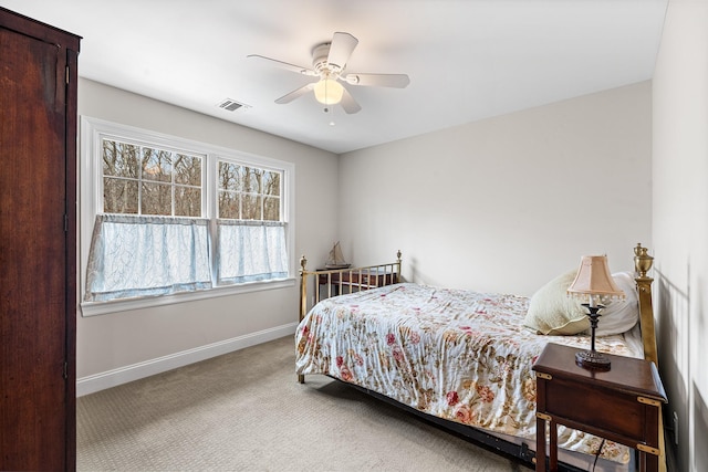 380 Hickory Rd, Southold, NY 11971 - bedroom featuring visible vents, baseboards, carpet, and ceiling fan