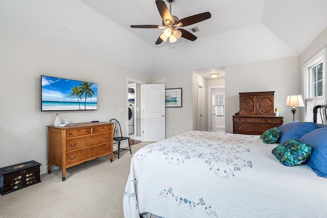 380 Hickory Rd, Southold, NY 11971 - bedroom featuring visible vents, washer / clothes dryer, light colored carpet, and vaulted ceiling