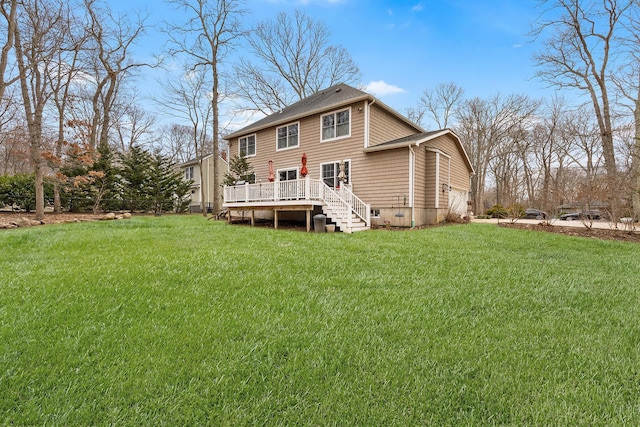 380 Hickory Rd, Southold, NY 11971 - back of property with crawl space, a yard, and a wooden deck