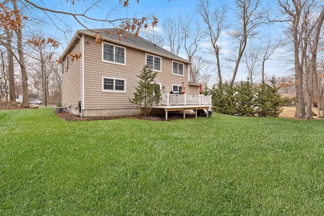 380 Hickory Rd, Southold, NY 11971 - rear view of property featuring cooling unit, a wooden deck, and a yard
