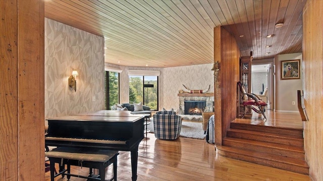 898 Gipsy Trail Rd, Carmel, NY 10512 - sitting room with wood ceiling, a fireplace, and hardwood / wood-style flooring