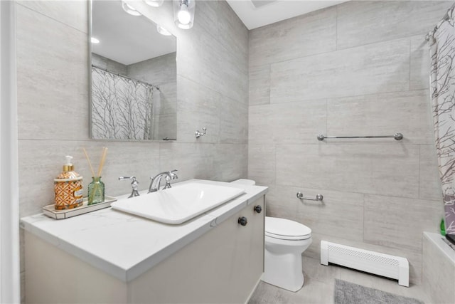 bathroom featuring toilet, baseboard heating, tile walls, and a shower with shower curtain