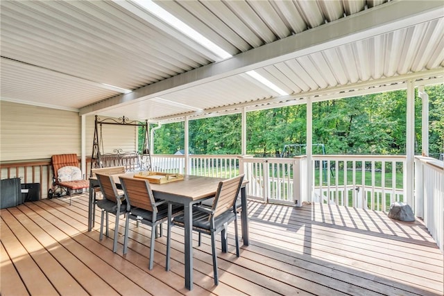 wooden deck with outdoor dining area