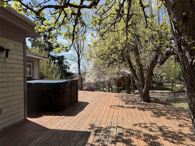 deck with a hot tub