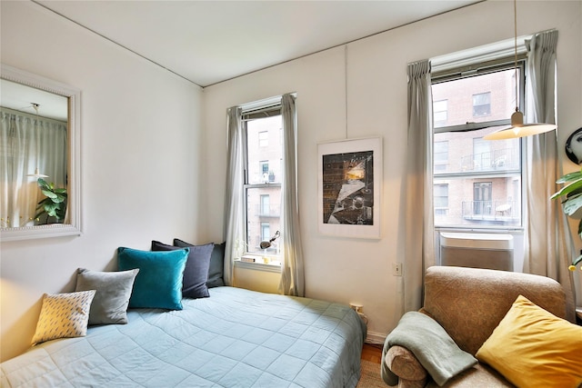 bedroom featuring multiple windows