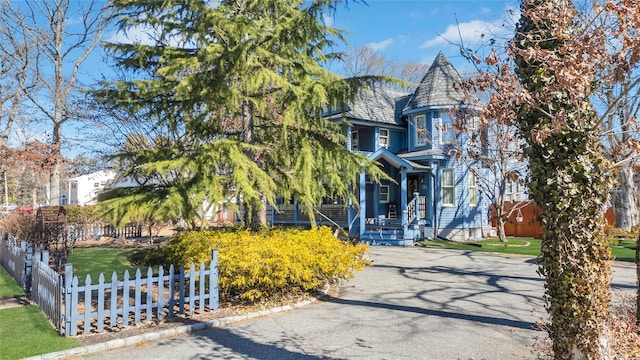 victorian house with fence