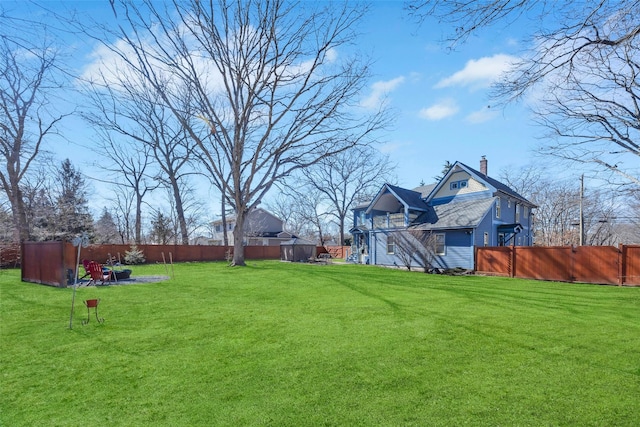 view of yard with fence