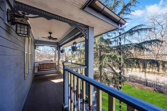 balcony featuring a ceiling fan