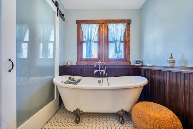 bathroom with a freestanding bath