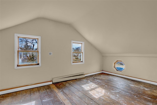 bonus room with lofted ceiling, wood-type flooring, and baseboard heating