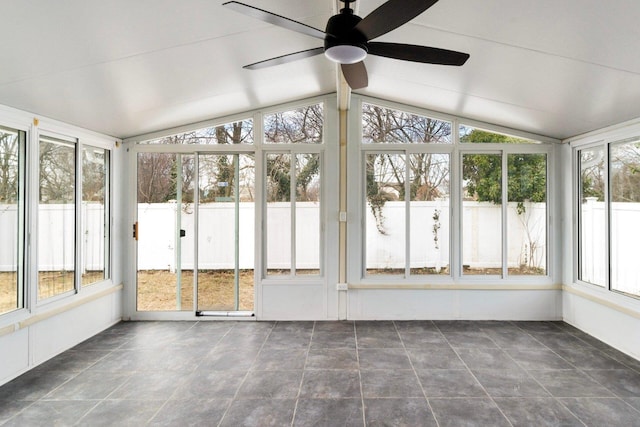 unfurnished sunroom with a ceiling fan and lofted ceiling