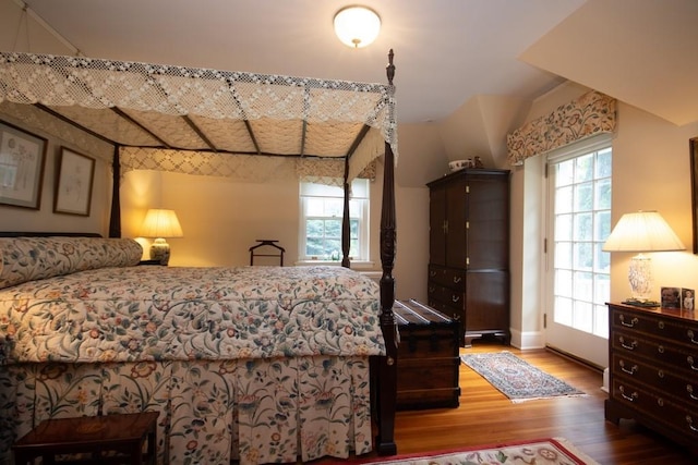 bedroom featuring wood finished floors