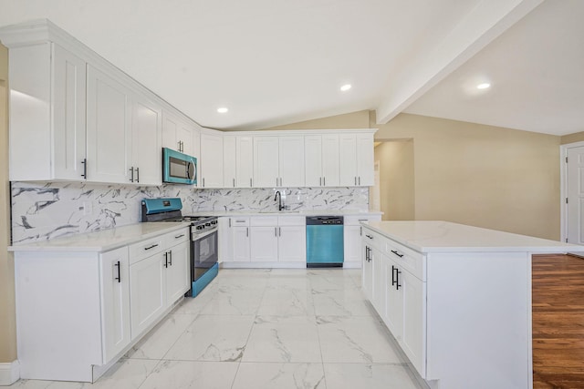 kitchen featuring vaulted ceiling with beams, a sink, decorative backsplash, stainless steel appliances, and marble finish floor