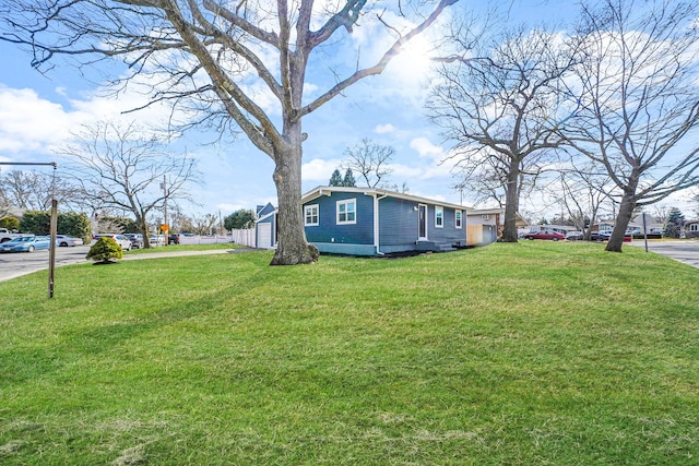 view of yard with a garage