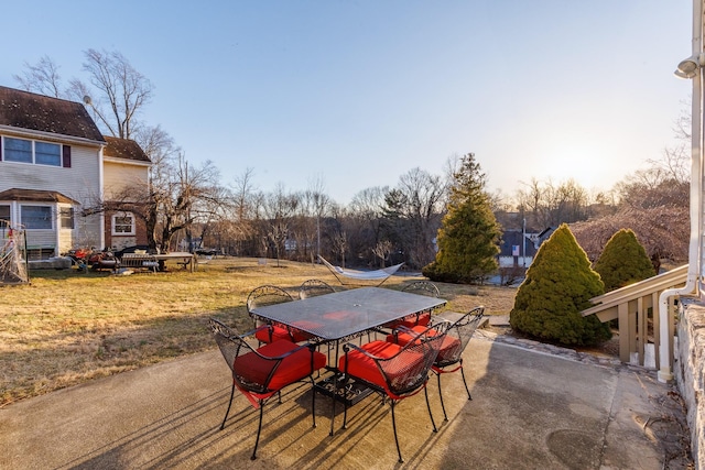 view of patio featuring outdoor dining area