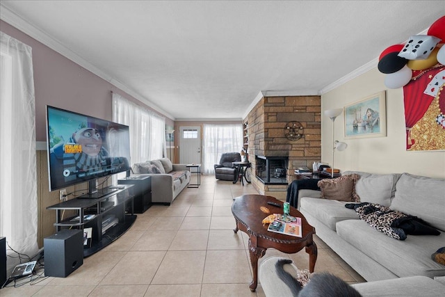 living room featuring light tile patterned floors, a fireplace, and crown molding
