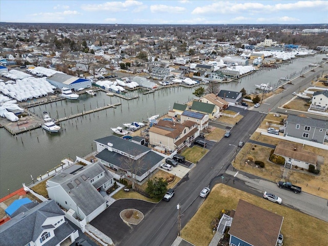 aerial view with a water view and a residential view
