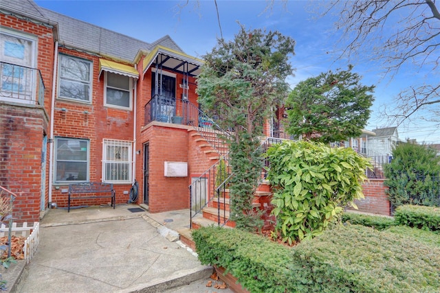 view of front of property featuring brick siding