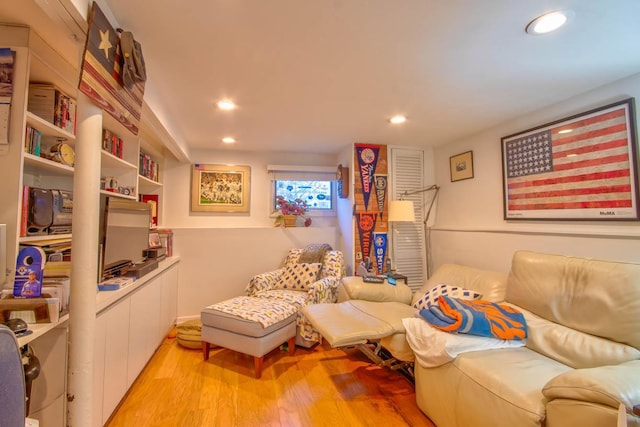 living room with recessed lighting and light wood-type flooring