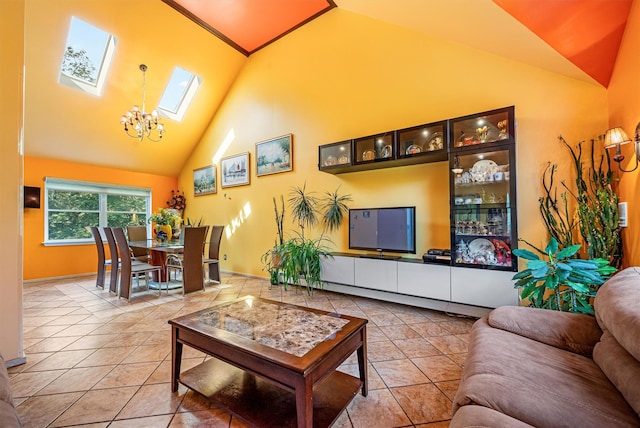 tiled living area with a skylight, high vaulted ceiling, and an inviting chandelier