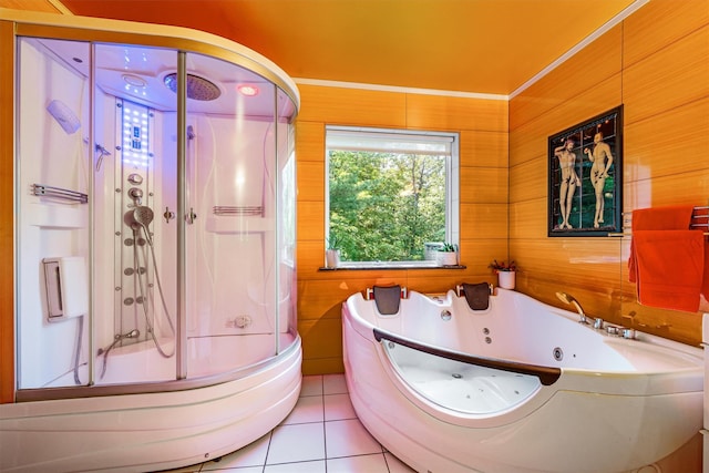 bathroom featuring a stall shower, a whirlpool tub, and tile patterned floors