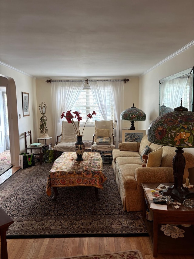 42-30 196th St, Flushing, NY 11358 - living room featuring crown molding, arched walkways, and wood finished floors
